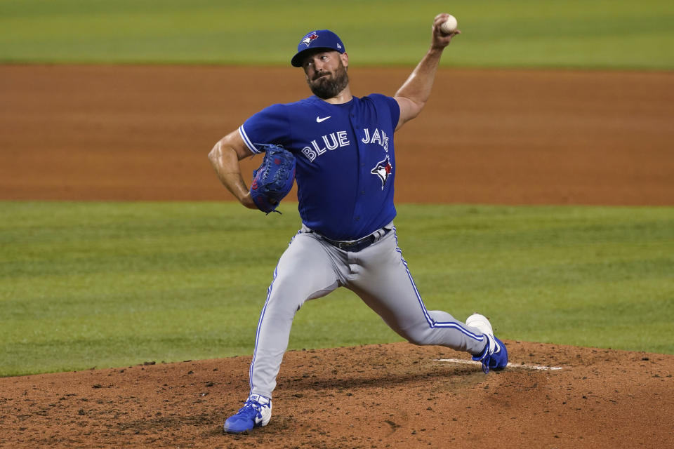 Toronto Blue Jays starting pitcher Robbie Ray aims a pitch during the fourth inning of a baseball game against the Miami Marlins, Wednesday, June 23, 2021, in Miami. (AP Photo/Marta Lavandier)