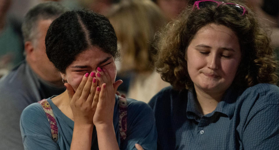 two women crying in protest after Supreme Court's abortion ruling