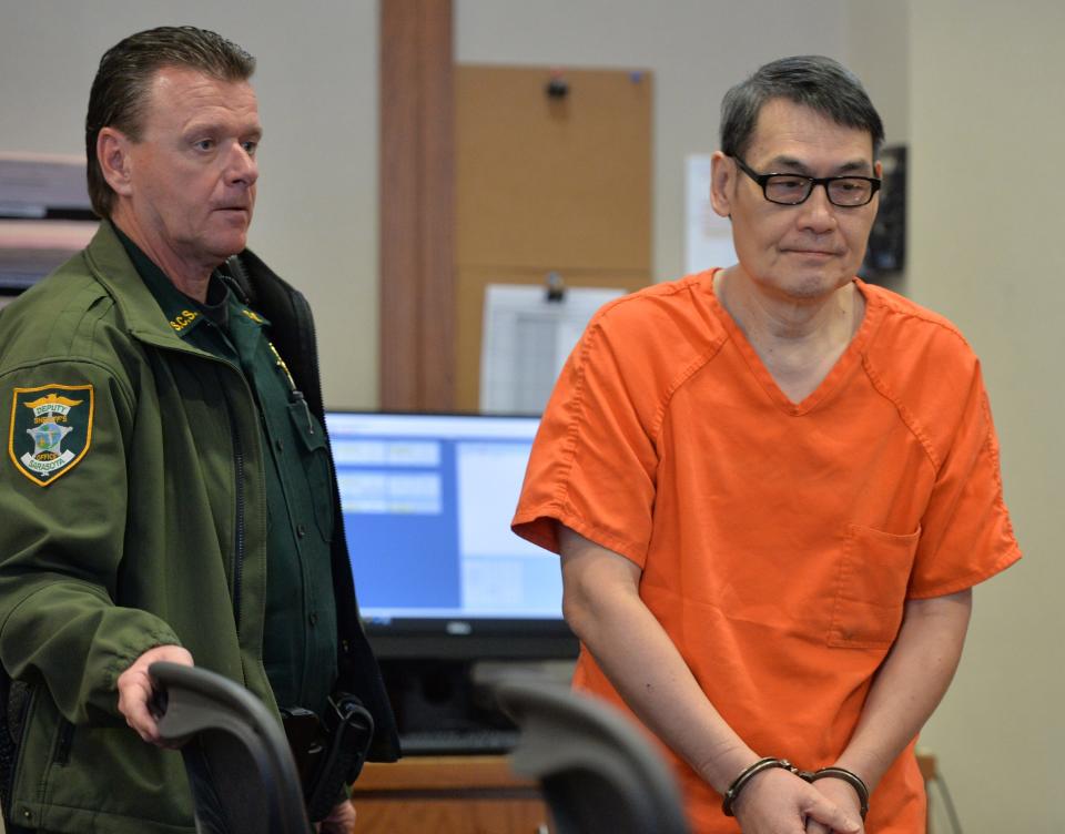 David Chang, right, enters the courtroom Tuesday, Mar. 21, 2023, in Sarasota for a plea hearing. Chang entered a plea of no contest in the hit and run death of 13-year old Lilly Glaubach in Osprey in August 2022 