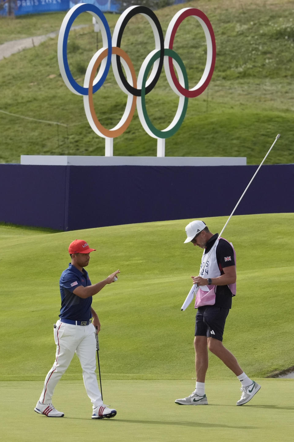 Schauffele and Rahm share lead in a starheavy chase for Olympic gold