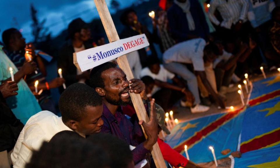 Congolese activists attend a vigil in memory of the civilians killed in the recent conflict between armed forces of DRC and rebel forces.