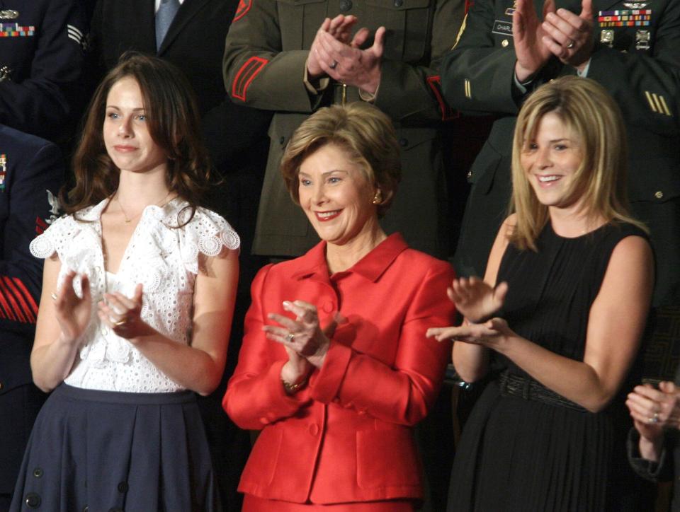 Laura Bush, flanked by her daughters, Barbara and Jenna. George