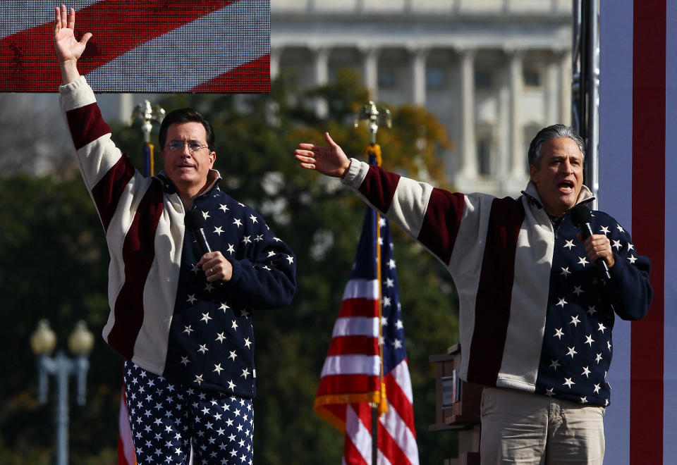 WASHINGTON - OCTOBER 30:  Comedians Steven Colbert (L) and Jon Stewart perform at the Rally To Restore Sanity And/Or Fear on the National Mall on October 30, 2010 in Washington, DC. Stewart and Colbert held the rally, which tens of thousands of people attended.  (Photo by Win McNamee/Getty Images)