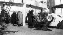 Survivors gather aboard the deck of the rescue ship Carpathia to make sense of the tragedy in the North Atlantic.