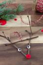 <p>This reindeer ornament will go down in (craft) history.</p><p><strong>Get the tutorial at <a href="https://www.firefliesandmudpies.com/twig-reindeer-ornaments/" rel="nofollow noopener" target="_blank" data-ylk="slk:Fireflies and Mud Pies" class="link ">Fireflies and Mud Pies</a>.</strong></p>