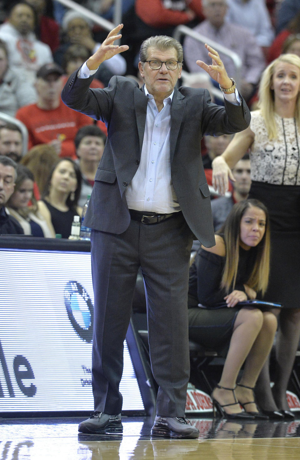 Connecticut coach Geno Auriemma sends in a play to his team during the second half of an NCAA college basketball game against Louisville in Louisville, Ky., Thursday, Jan. 31, 2019. Louisville won 78-69. (AP Photo/Timothy D. Easley)