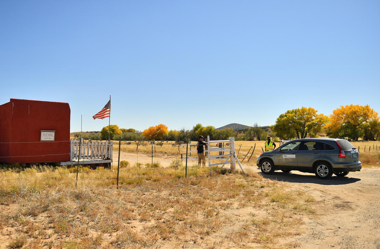 A vehicle from the Office of the Medical Investigator enters the front gate leading to the Bonanza Creek Ranch on Oct. 22, 2021, in Santa Fe, New Mexico. Director ofphotography Halyna Hutchins was killed and director Joel Souza was injured on the set while filming the movie 