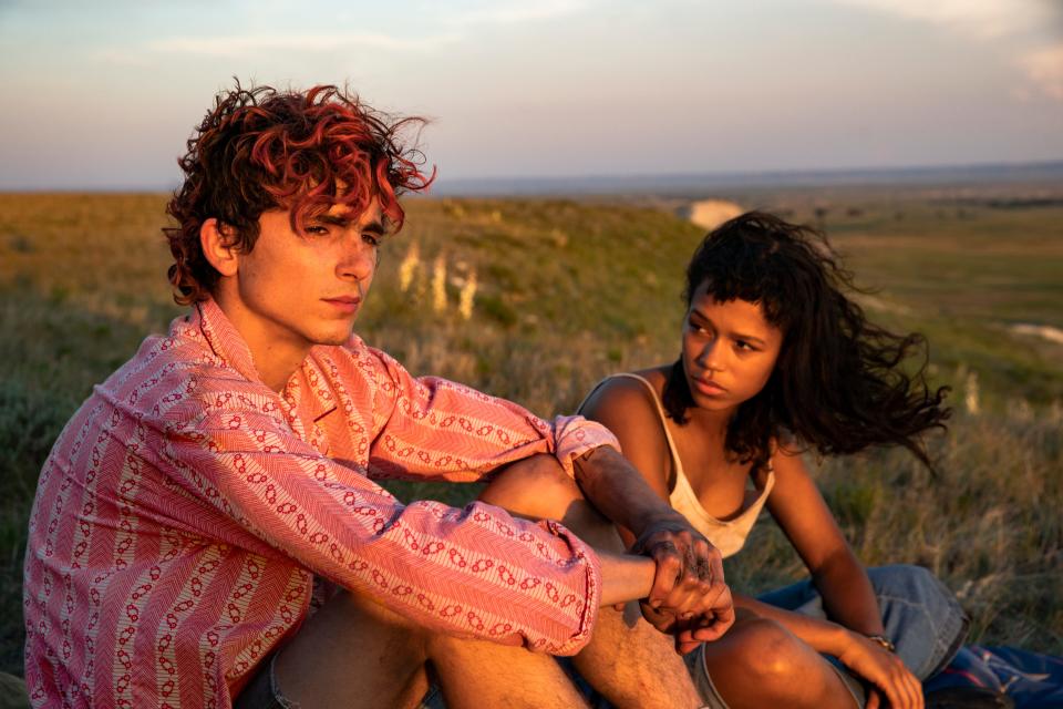 Timothée Chalamet, left, as Lee and Taylor Russell, right, as Maren in "Bones and All," directed by Luca Guadagnino.