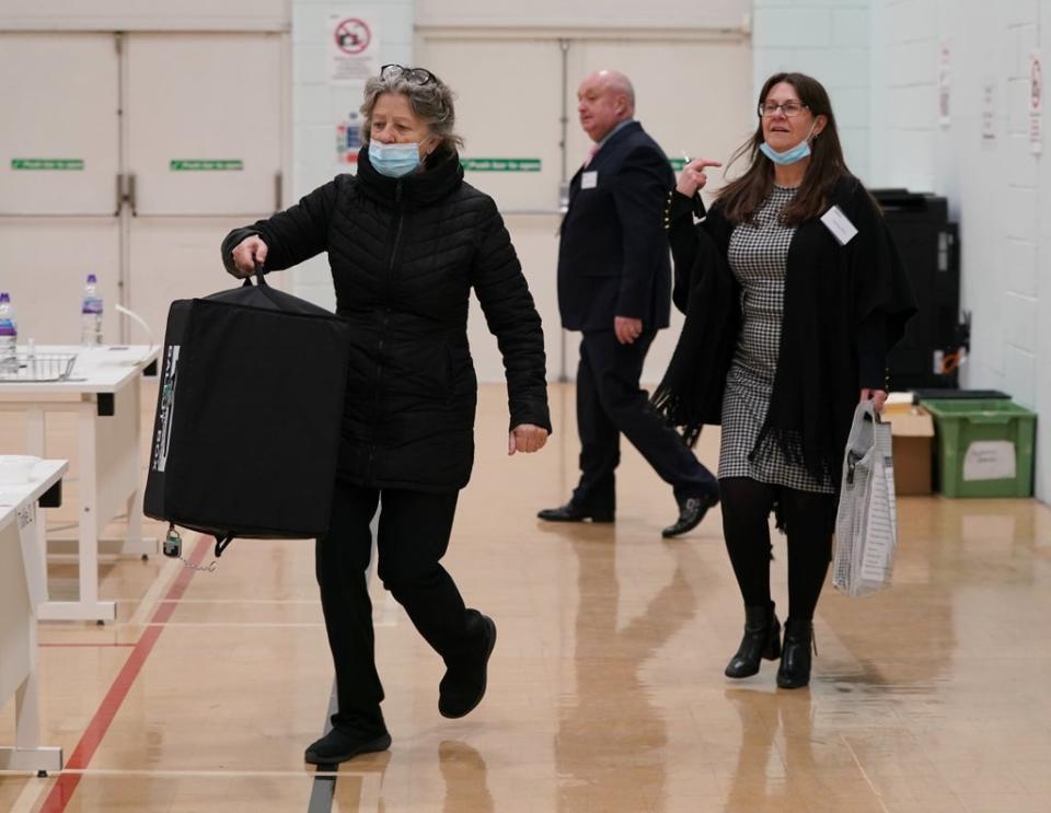 Ballot boxes arrive during the count for the Old Bexley and Sidcup by-election at Crook Log Leisure Centre in Bexleyheath, Kent. Picture date: Thursday December 2, 2021. (PA Wire)