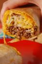 <p>So much cheese! </p><p>Get the recipe from <a href="https://www.delish.com/cooking/recipe-ideas/recipes/a52462/quesarito-recipe/" rel="nofollow noopener" target="_blank" data-ylk="slk:Delish;elm:context_link;itc:0;sec:content-canvas" class="link ">Delish</a>.</p>