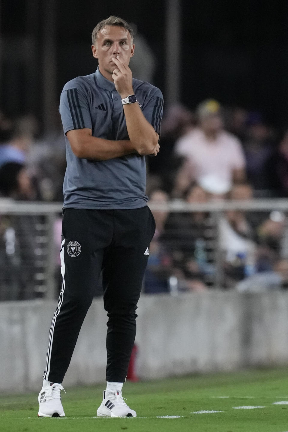 Inter Miami coach Phil Neville watches from the sideline during the first half of the team's MLS soccer match against the New York Red Bulls, Wednesday, May 31, 2023, in Fort Lauderdale, Fla. (AP Photo/Rebecca Blackwell)
