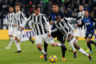 Soccer Football - Serie A - Juventus vs Inter Milan - Allianz Stadium, Turin, Italy - December 9, 2017 Juventus’ Blaise Matuidi and Paulo Dybala in action with Inter Milan's Matias Vecino REUTERS/Stefano Rellandini