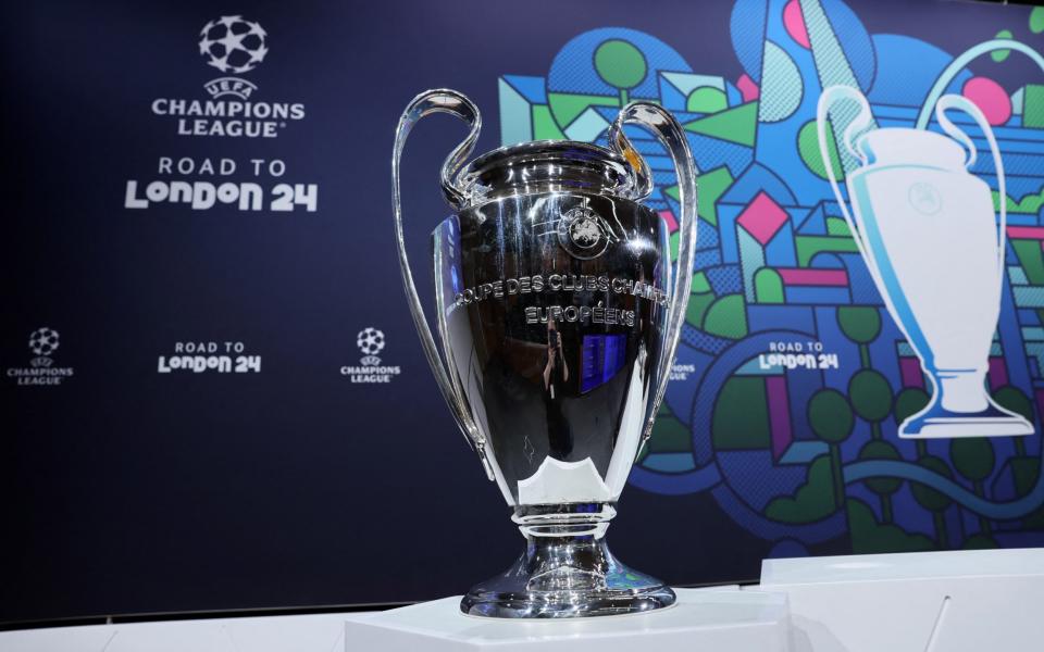 The Champions League trophy is pictured before the draw