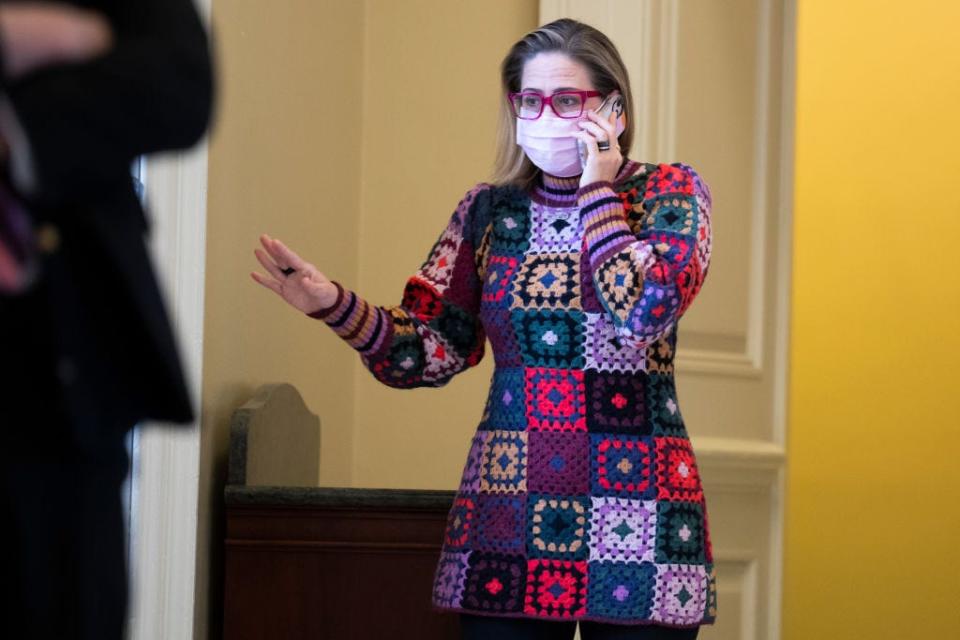 Kyrsten Sinema wears a crocheted dress