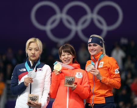 Speed Skating - Pyeongchang 2018 Winter Olympics - Women's Mass Start competition finals - Gangneung Oval - Gangneung, South Korea - February 24, 2018 - Bo-Reum Kim of South Korea, Nana Takagi of Japan and Irene Schouten of the Netherlands pose with medals. REUTERS/Lucy Nicholson