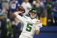 New York Jets quarterback Mike White (5) throws before an NFL football game between the New York Jets and Indianapolis Colts, Thursday, Nov. 4, 2021, in Indianapolis. (AP Photo/Michael Conroy)