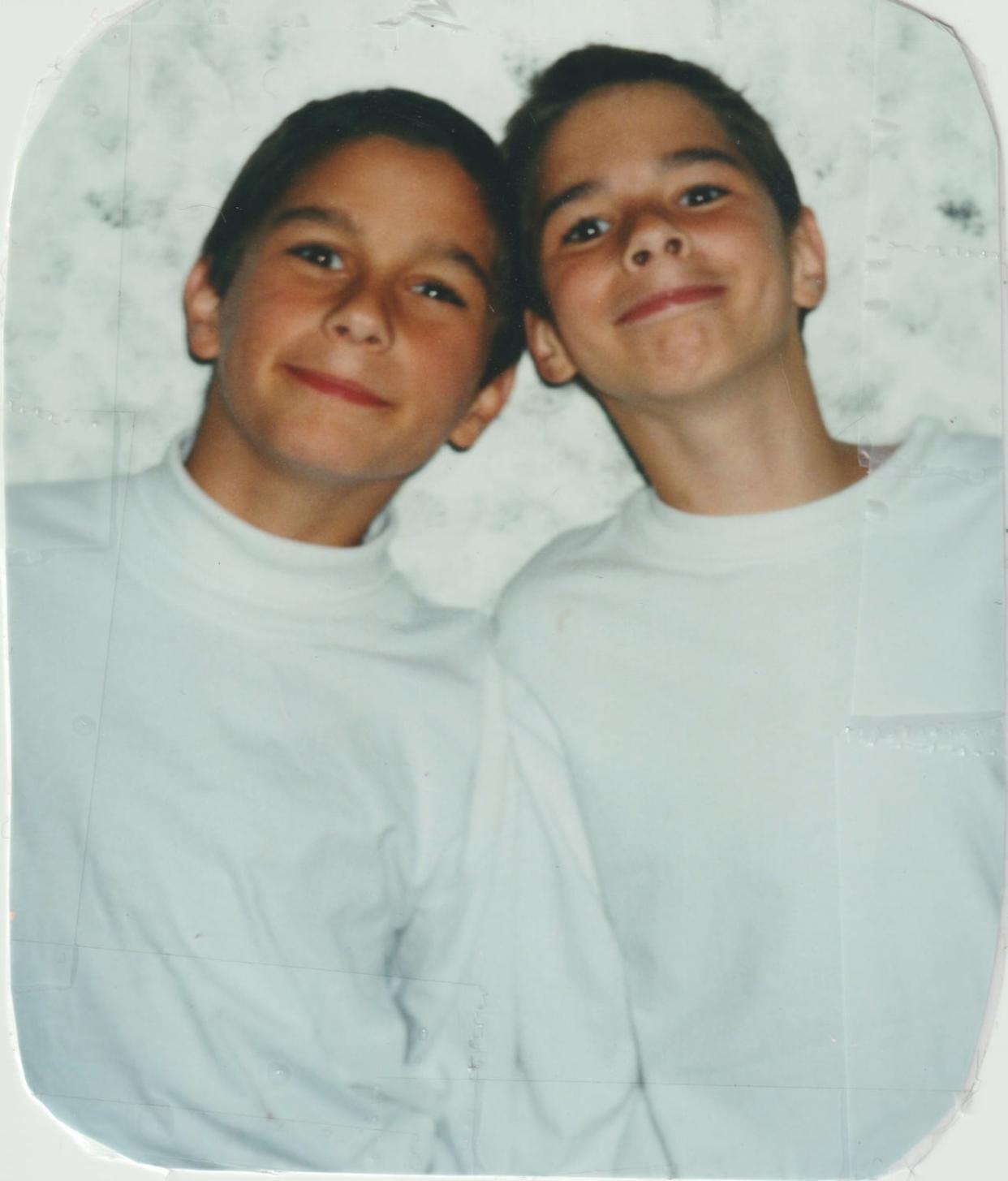 Attila Csanyi, left, with his twin brother Richard as children. They spent part of their childhood in foster care in Toronto. Richard testified on the second day of the inquest into his brother's death four years ago.  (Submitted by Nisus Pictures - image credit)