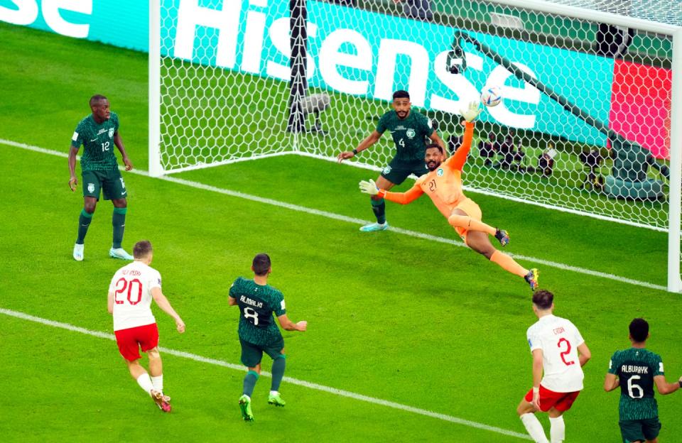 Poland's Piotr Zielinski scores their side's first goal of the game during the FIFA World Cup Group C match at the Education City Stadium in Doha, Qatar. Picture date: Saturday November 26, 2022. (Photo by Peter Bryne/PA Images via Getty Images)