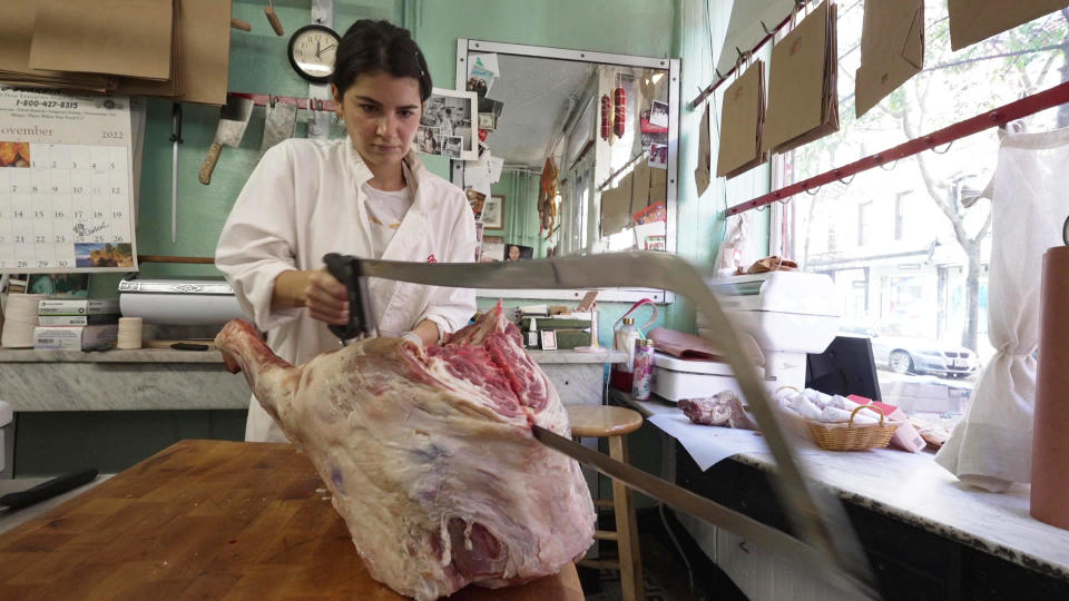 Jennifer Prezioso took over her grandfather Moe's butcher shop. / Credit: CBS News