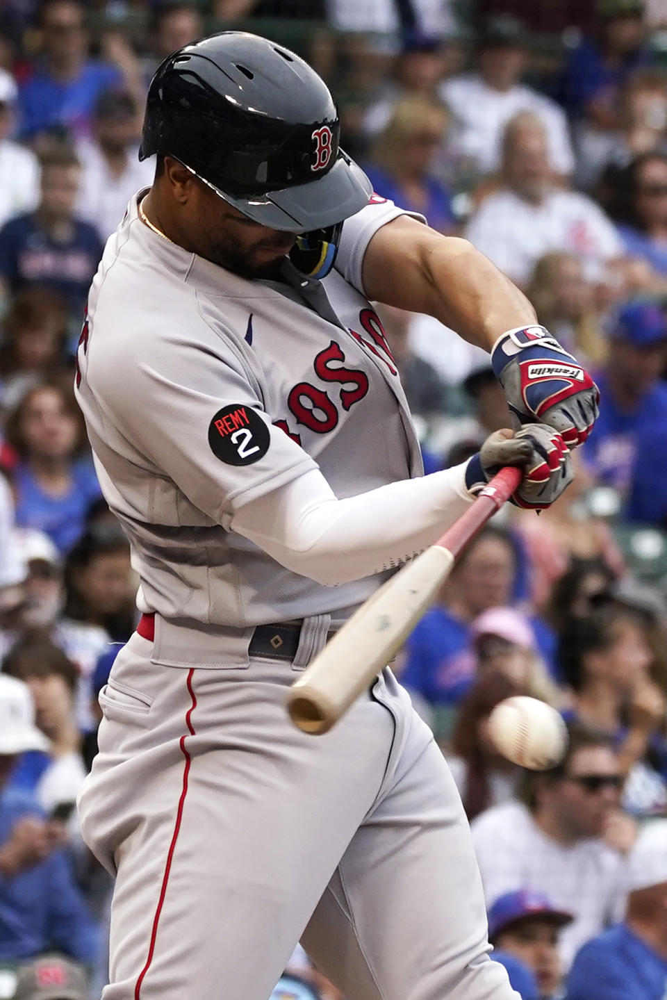 Boston Red Sox's Xander Bogaerts hits a single during the first inning of a baseball game against the Chicago Cubs in Chicago, Friday, July 1, 2022. (AP Photo/Nam Y. Huh)