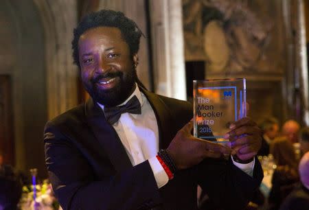 Marlon James, winning author or "A Brief History of Severn Killings", poses with his award at the ceremony for the Man Booker Prize for Fiction 2015 in London, Britain October 13, 2015. REUTERS/Neil Hall