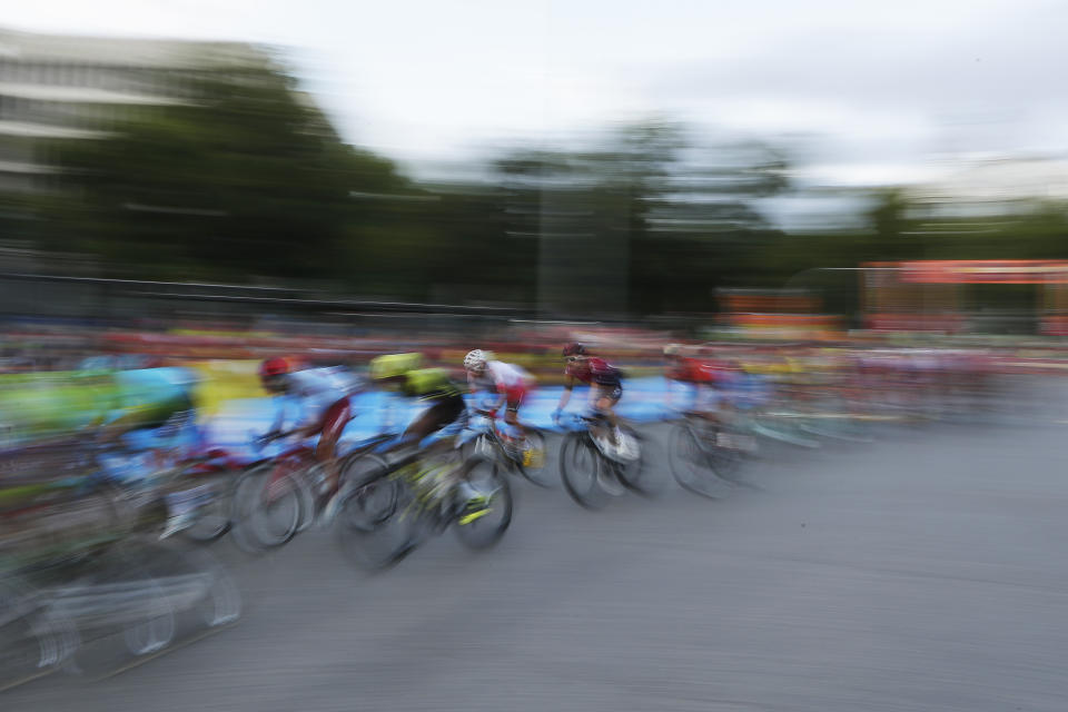 Riders arrive in the Spanish capital during the La Vuelta cycling race in Madrid, Spain, Sunday, Sept. 15, 2019. (AP Photo/Manu Fernandez)