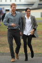 <p>On day two of the Duke and Duchess of Sussex’s Australian royal tour, Meghan suited up. The Duchess wore a £110 ‘Boss’ jacket by close friend and sportswoman Serena Williams, a shirt by Maison Kitsune and J. Crew ankle boots. In a dipomatic move, she finished the ensemble with a pair of ‘Harriet’ jeans from Aussie label Outland Denim. <em>[Photo: Getty]</em> </p>