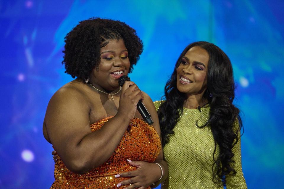 Cousins and Rockford natives Evandia Penix and Michelle Williams perform together on Fox's new television game show "We are Family," which aired Wednesday, Jan. 3, 2024.