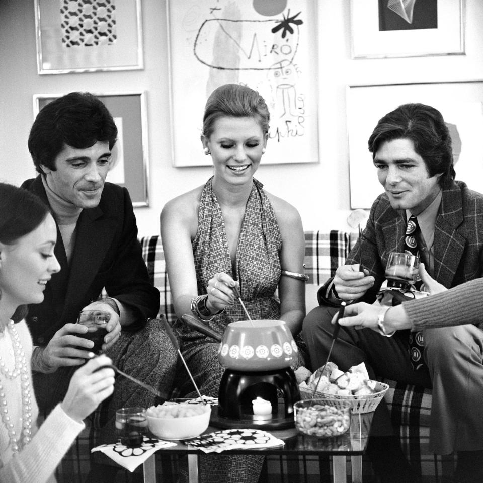 <p>Instead of always going out with friends, get everyone together for a potluck or fondue night. Then enjoy their company instead of fretting over presenting a perfect-but-pricey Instagram-worthy event.</p>