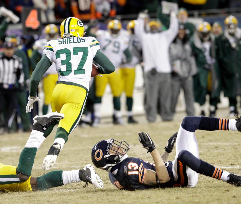 Green Bay Packers cornerback Sam Shields intercepts a pass intended for Chicago Bears wide receiver Johnny Knox to seal the NFC championship victory.