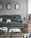 <p> Pick a plump sofa for lounging. This charcoal grey number adds elegance and interest to a minimal room. Explore the many depths of a grey colour palette by layering tones to create a scheme that looks cohesive. </p> <p> By using the same colour, but in both its palest and deepest incarnations, you can create a rich, contrasting look that is co-ordinated. A glass coffee table and side table add a glamorous note. </p>