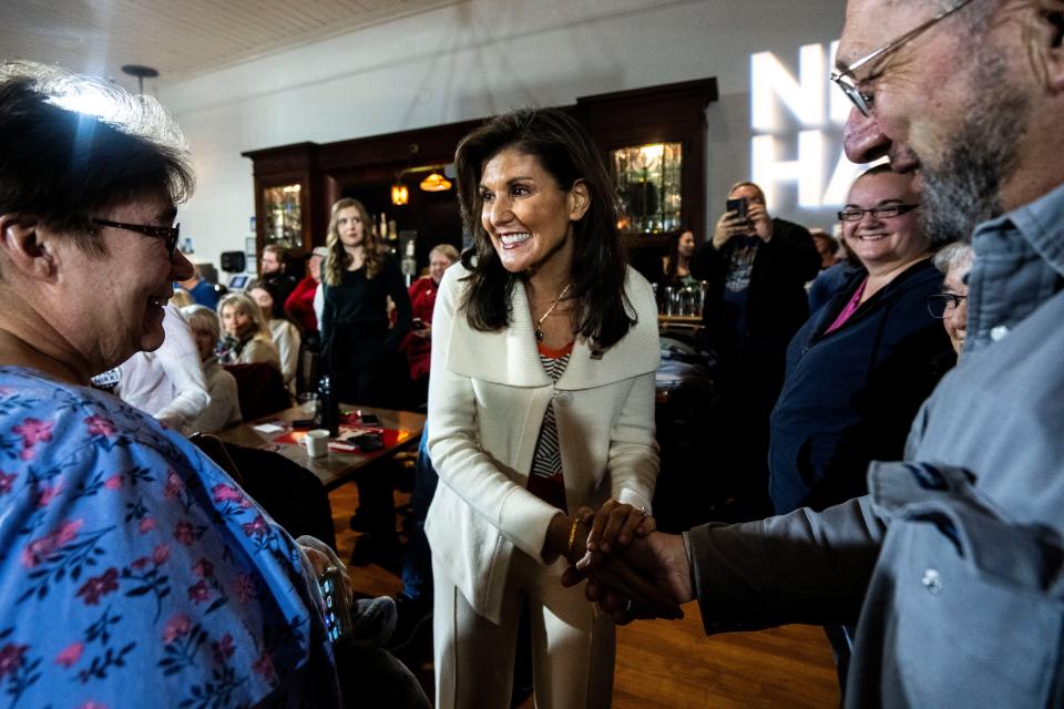 Republican presidential candidate Nikki Haley shakes hands with a supporter during a campaign stop at K & B Emporium on Saturday, Dec. 9, 2023, in Clear Lake.