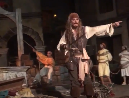 Spotted... Johnny Depp doing his best animatronic pirate at Disneyland - Credit: Twitter