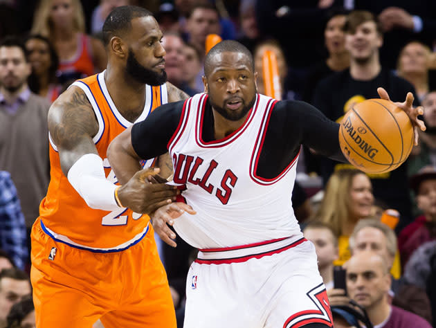 LeBron James and Dwyane Wade, not in uniform. (Getty Images)