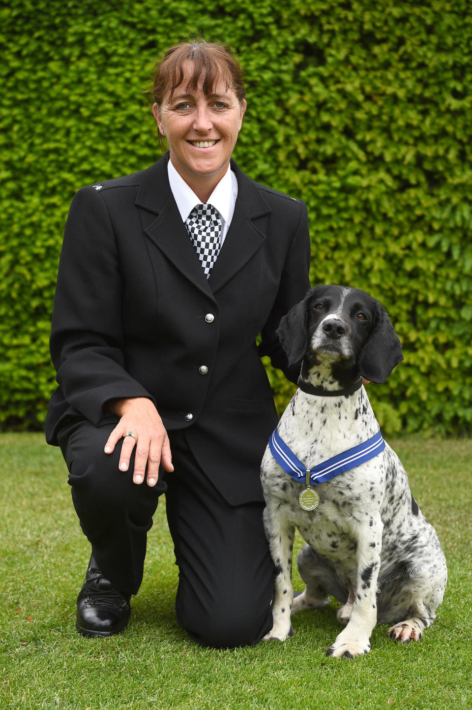 Police dog Ollie, with his handler PC AnnaMarie Charnley, at the Honorable Artillery Company in London receiving the PDSA Order of Merit. Nineteen hero police dogs are receiving an award for helping emergency services during the 2017 London terror attacks at Westminster Bridge, London Bridge and Borough Market.