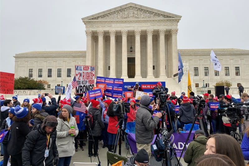 Hundreds of supporters of gun control laws rally in front of the US Supreme Court