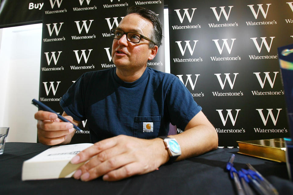 Author Charlie Higson signs his new Young Bond book during Spy Day at the Science Museum in London, being held to celebrate the opening of The Science of Spying exhibition.   (Photo by Ben Stanstall - PA Images/PA Images via Getty Images)