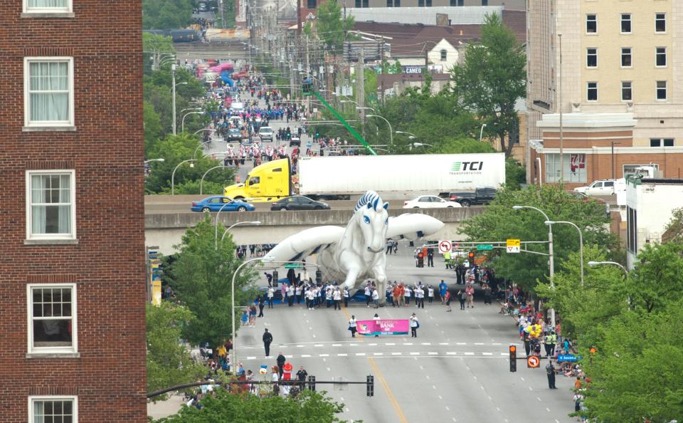 The Pegasus balloon makes its way out from under the I-65 Broadway overpass during the 2019 KDF Pegasus Parade.02 May 2019