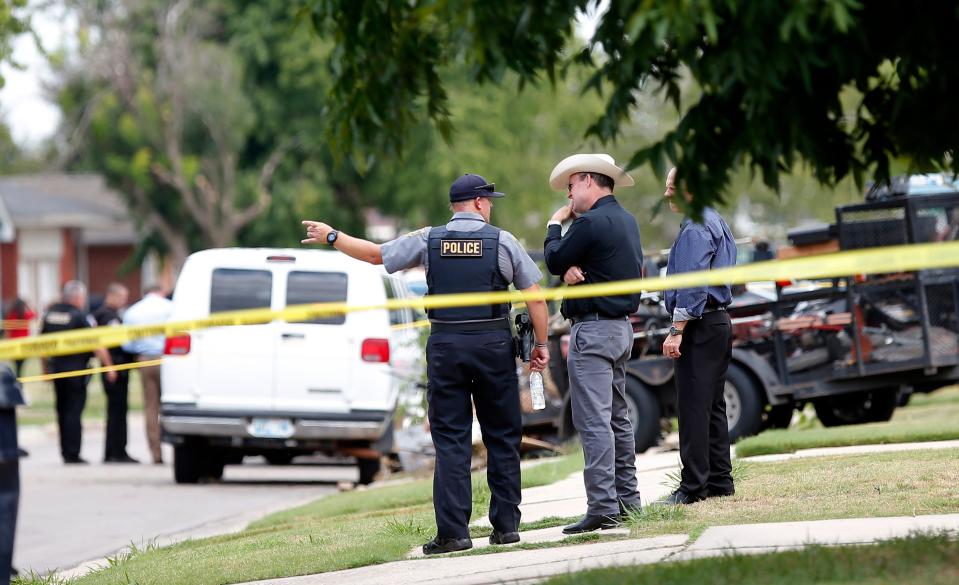 Authorities investigate Monday's shooting of two Oklahoma County sheriff's deputies at a home near SW 78 and S Pennsylvania Avenue in Oklahoma City.