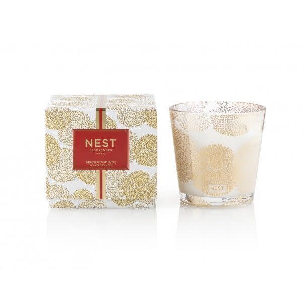 <p>This massive candle will make your home smell like a winter forest for all of its 150 hour burn time and beyond. <a href="http://www.nestfragrances.com/birchwood-pine-3-wick-candle-879" rel="nofollow noopener" target="_blank" data-ylk="slk:Nest Birchwood Pine 3-Wick Candle" class="link ">Nest Birchwood Pine 3-Wick Candle</a> ($58)<br></p>