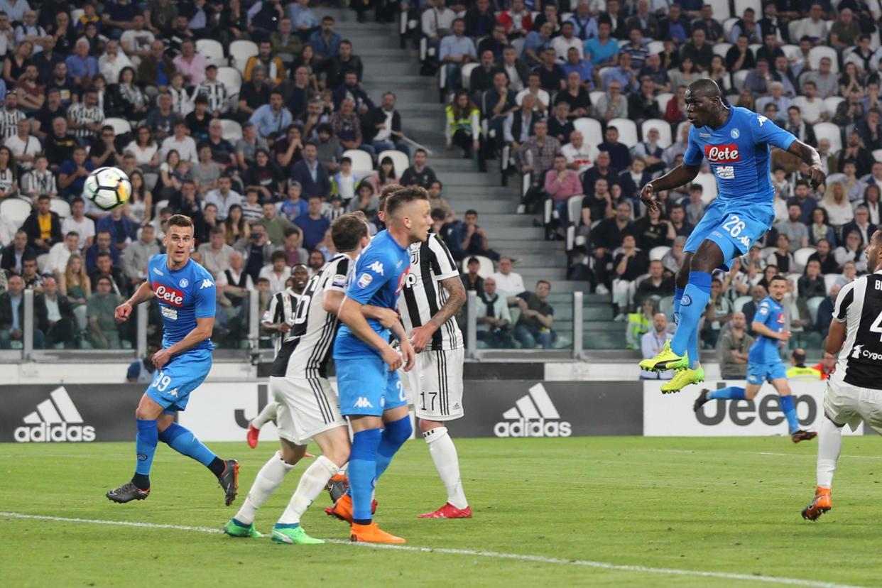 Late winner: Kalidou Koulibaly powers home a late winner for Napoli: Getty Images