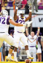 BATON ROUGE, LA - OCTOBER 22: Kenny Hilliard #27 of the LSU Tigers celebrates after scoring a touchdown during the first half of the game against the Auburn Tigers at Tiger Stadium on October 22, 2011 in Baton Rouge, Louisiana. (Photo by Jamie Squire/Getty Images)