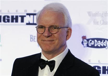 Actor and comedian Steve Martin arrives on the red carpet at the Muhammad Ali Celebrity Fight Night Awards XIX in Phoenix, Arizona in this March 23, 2013 file photo. REUTERS/Ralph Freso/Files