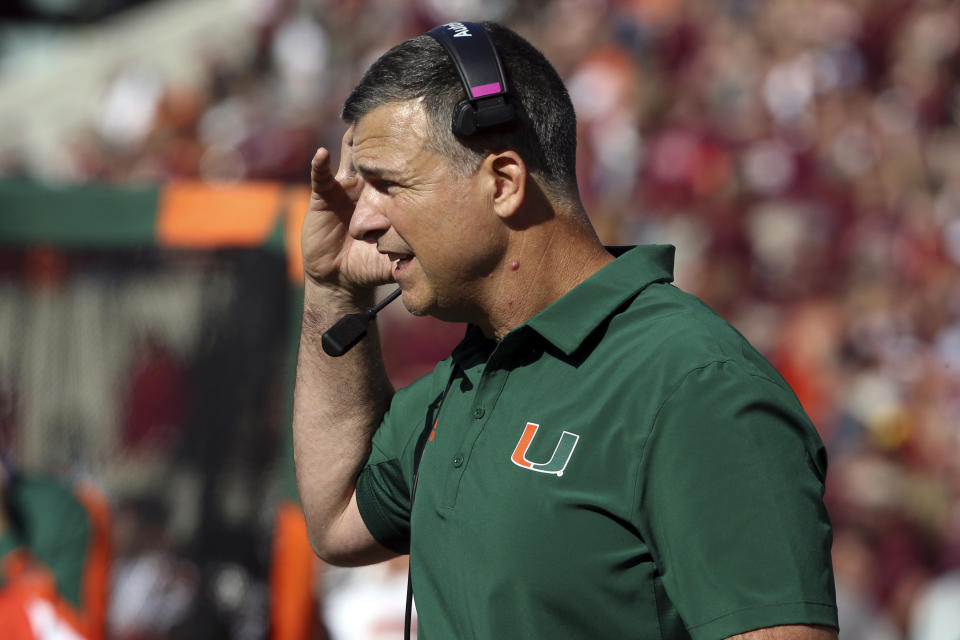 Miami head coach Mario Cristobal watches in the second half of an NCAA football game against Virginia Tech, Saturday Oct. 15 2022, in Blacksburg Va. (Matt Gentry/The Roanoke Times via AP)