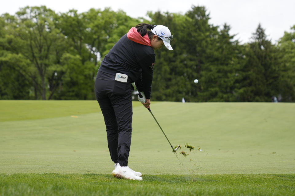 Rose Zhang hits an approach shot on the fourth hole during the final round of the LPGA Cognizant Founders Cup golf tournament, Sunday, May 12, 2024, in Clifton, N.J. (AP Photo/Seth Wenig)