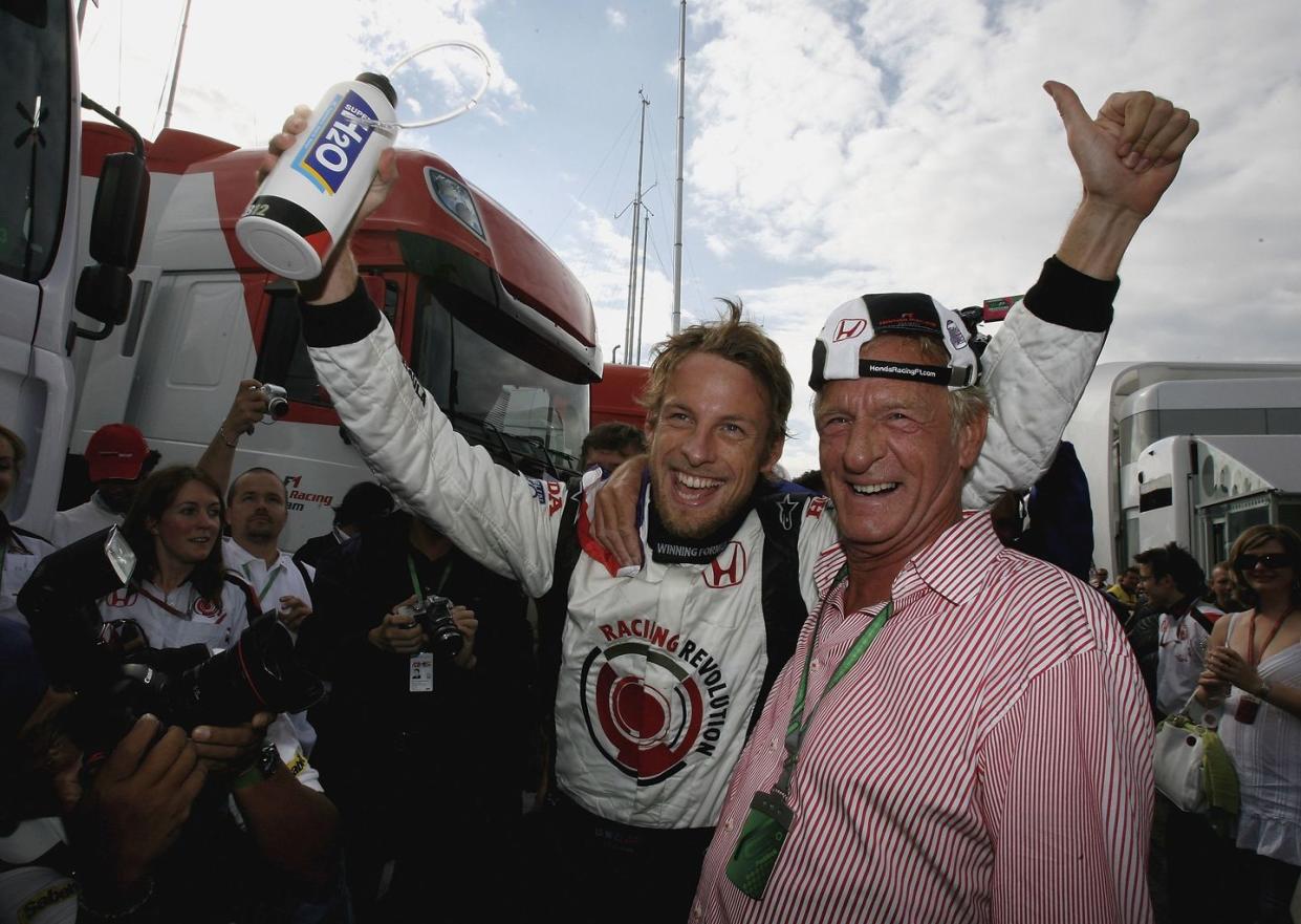 budapest, hungary august 06 jenson button of great britain and honda racing celebrates with his dad john during the hungarian formula one grand prix at the hungaroring on august 6, 2006 in budapest, hungary photo by mark thompsongetty images