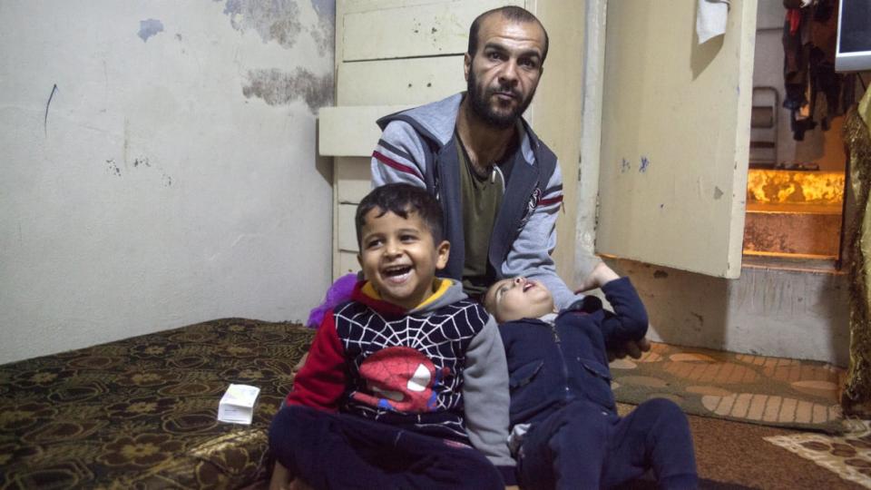 <div class="inline-image__caption"><p>Ra’ad Hariri and his two sons sit in their one room apartment they have rented since being evicted from their house in Karantina following renovations after the Port explosion.</p></div> <div class="inline-image__credit">Tessa Fox for The Daily Beast</div>