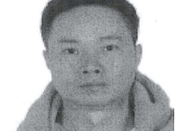 Qiming Lin, accused by federal prosecutors of being a Chinese operative who tried to set a honey trap for a dissident living on Long Island