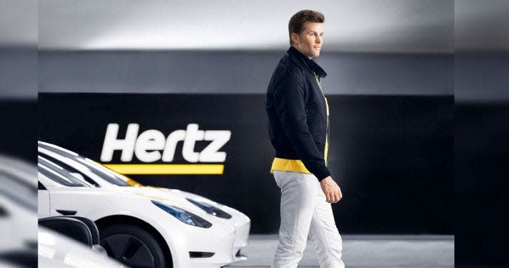 Football superstar Tom Brady signs on to be spokesman for Hertz, which just announced plans to purchase 100,000 Tesla vehicles and make its global fleet 20% all electric.
