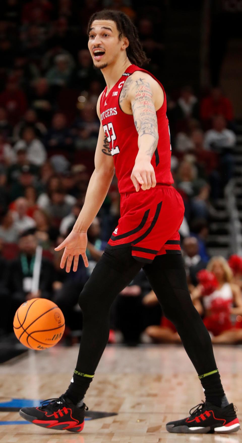 Rutgers guard Caleb McConnell (22) drives to the basket during the Big Ten Men’s Basketball Tournament game against Purdue on March 10 at United Center in Chicago.